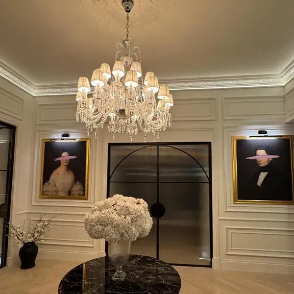 Tiered crystal chandelier in a grand foyer